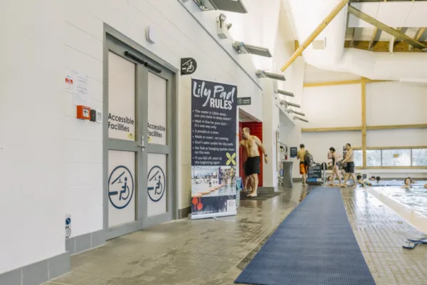 Photo of the door to the accessible change room at Albany Stadium Pool.