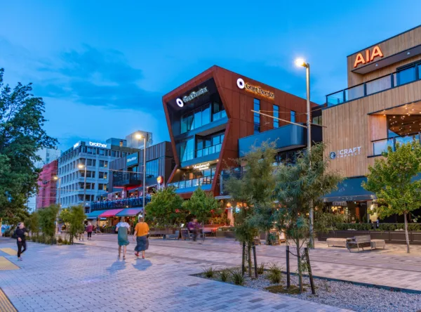 A nighttime photo of some new commercial buildings in central Christchurch.