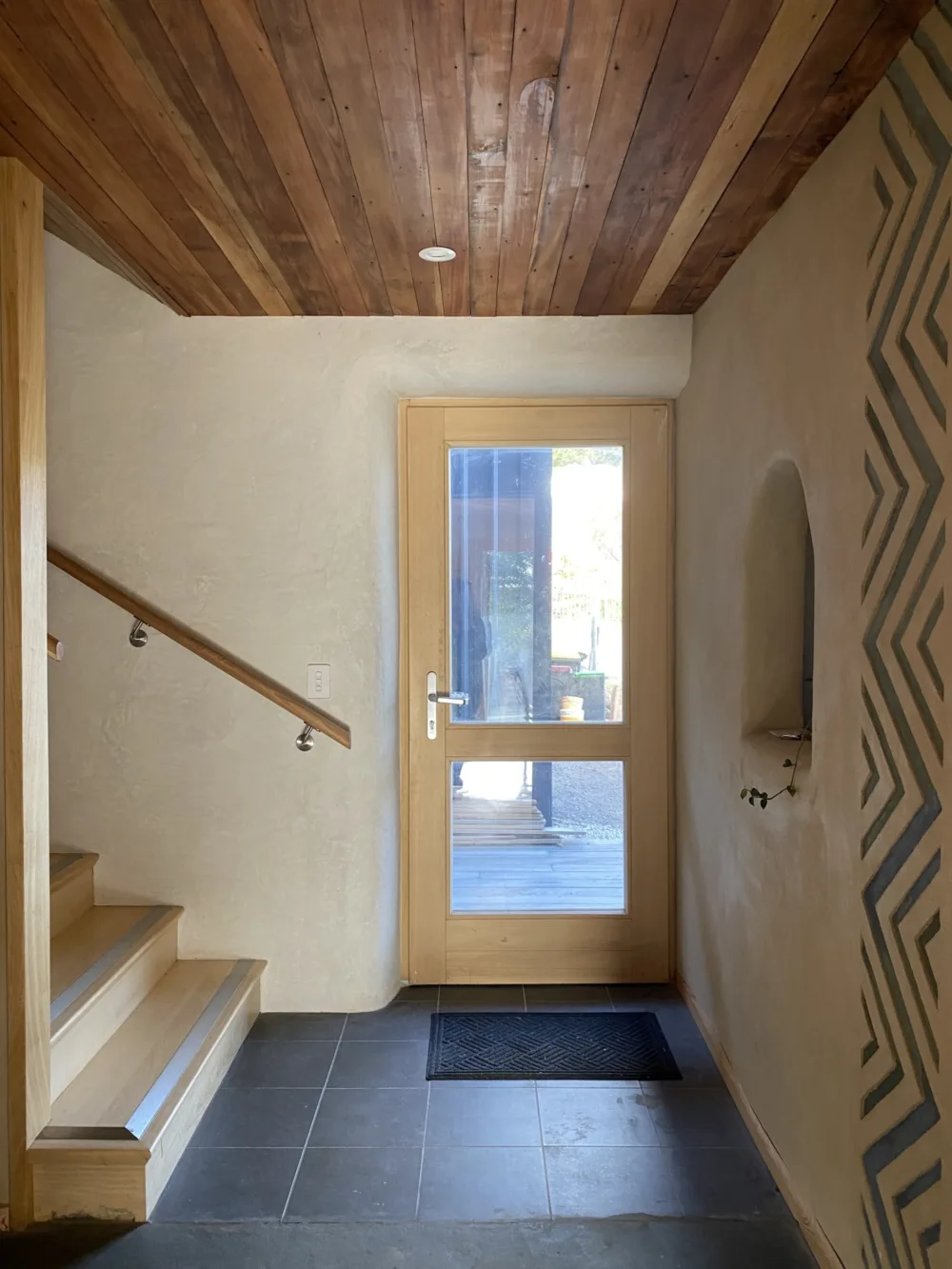 The back door and internal staircase.